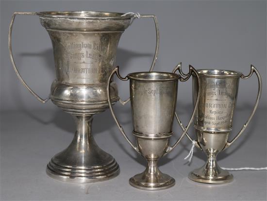 Three silver trophy cups